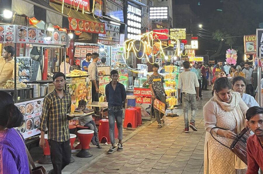 Agra: Sadar Bazar Food Market Night Walking Tour by Tuk-Tuk - Walking through Sadar Bazar after dark