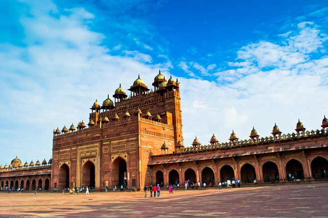 All-Inclusive Private Sunrise Taj Mahal & Agra City Tour - Breakfast, then the red sandstone walls of Agra Fort