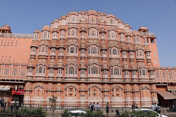 Explore Full Day Jaipur Guided Tour by Car with Guide - Royal Gaitor Tombs, marble work in a quiet setting