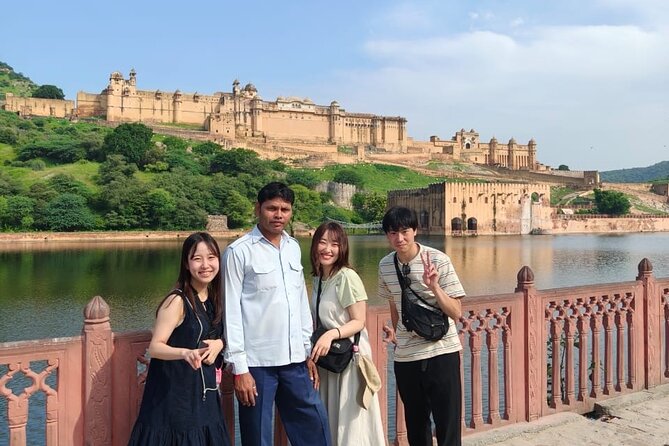 Explore Full Day Jaipur Guided Tour by Car with Guide - Jal Mahal, a short lakefront photo stop