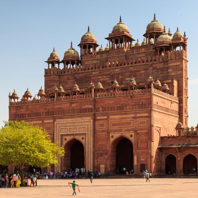 From Agra: Fatehpur Sikri and Market Private Half-Day Tour - Walking through the abandoned Mughal city