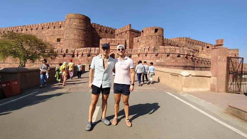 From Jaipur: Private Taj Mahal & Agra Day Trip with 5<em> Lunch – Meeting your Agra guide at the Taj Mahal’ /></p>
<p><p>Your licensed local guide meets you in Agra and leads you into the Taj Mahal complex. The guide can handle monument tickets if you choose the ticket-included option, and skip-the-line access is advertised as part of the experience. Check the exact option carefully, since tickets are not included in every booking choice.</p>
</p>
<p><p>You can spend up to three hours at the Taj Mahal. That is enough time to appreciate the main view, walk through the grounds, enter the mausoleum area, and stop for photographs without being pushed through in a few minutes.</p>
</p>
<p><p>A good guide adds more than facts. Anshu, Ankur Sharma, Mehfooz, Arif, Imran Ali Khan, and several others are repeatedly praised for clear English, warm manners, and useful timing advice. Guides have helped visitors move through busy areas, answer questions, and find photo angles that avoid some of the surrounding crowd.</p>
</p>
<p><p>Photography is a real part of the experience here. Several guides, including Ankur Sharma, Mehfooz, Anshu, and Fez, are singled out for taking excellent pictures with visitors’ phones. That can be especially helpful for solo visitors and families who would otherwise have to ask strangers for every photograph.</p>
</p>
<p><p>Your guide may also explain the marble work, the building’s design, and the story behind the monument. The best approach is to ask questions rather than simply follow a memorized speech. Past visitors especially valued guides who adjusted the explanation to their interests and made the history easy to follow.</p>
</p>
<p><p>The Taj Mahal is closed every Friday, so plan around that. Bring your passport or another ID card, along with sunglasses. Drones, alcohol, and drugs are not allowed.</p>
</p>
<h2 id="agra-fort-where-the-emperor-lived">Agra Fort, where the emperor lived</h2>
<p> Lunch – Agra Fort, where the emperor lived’ /></p>
<p><p>After the Taj Mahal, the route continues to Agra Fort for about an hour of guided sightseeing. This red sandstone complex gives you a different view of Mughal power. The Taj Mahal is a mausoleum and a symbol of love. Agra Fort was a working imperial center, with gates, courtyards, palaces, and views toward the Taj.</p>
</p>
<p><p>I like this pairing because the two monuments balance each other. At the Taj, you focus on symmetry, marble, and the emotional story of Shah Jahan. At Agra Fort, you get a stronger sense of court life, defense, royal apartments, and political control.</p>
</p>
<p><p>One hour is enough for a useful introduction, but it will not allow you to linger over every section. Your guide’s ability to manage time matters here. Arif, Anshu, Vinod Kumar, and Mehfooz were praised for keeping the visit organized while still leaving room for questions.</p>
</p>
<p><p>The fort can feel more demanding than the Taj because of its size and walking route. Wear comfortable shoes, and keep water with you. The included bottle helps, but drinks beyond that are not included.</p>
</p>
<div class="twil" style="margin: 20px 0; padding: 15px 0;"><p>More Taj Mahal tours:</p><ul style="margin: 10px 0; padding-left: 0; list-style: none;"><li style="margin: 0 0 12px 0; padding: 0 0 12px 0; border-bottom: 1px solid #F3E1E7; line-height: 1.4;"><a href="https://jaipur-travel.com/agra-skip-the-line-taj-mahal-agra-fort-private-tour/">Agra: Skip-the-Line Taj Mahal & Agra Fort Private Tour</a><br><span style="font-size: 0.82em; color: #6E4B58;"><span style="color: #FFB020;">★</span> 4.9 &nbsp;&middot;&nbsp; 1,546 reviews</span></li><li style="margin: 0 0 12px 0; padding: 0 0 12px 0; border-bottom: 1px solid #F3E1E7; line-height: 1.4;"><a href="https://jaipur-travel.com/agra-taj-mahal-express-entry-tickets/">Agra: Taj Mahal Express Entry Tickets</a><br><span style="font-size: 0.82em; color: #6E4B58;"><span style="color: #FFB020;">★</span> 4.8 &nbsp;&middot;&nbsp; 684 reviews</span></li><li style="margin: 0 0 12px 0; padding: 0 0 12px 0; border-bottom: 1px solid #F3E1E7; line-height: 1.4;"><a href="https://jaipur-travel.com/agra-taj-mahal-and-mausoleum-guided-tour-with-skip-the-line/">Agra: Taj Mahal and Mausoleum Guided Tour with Skip-the-Line</a><br><span style="font-size: 0.82em; color: #6E4B58;"><span style="color: #FFB020;">★</span> 4.8 &nbsp;&middot;&nbsp; 631 reviews</span></li><li style="margin: 0; padding: 0; border-bottom: none; line-height: 1.4;"><a href="https://jaipur-travel.com/private-guided-taj-mahal-tour-with-skip-the-line-entry-ticket/">Private Guided Taj Mahal Tour with Skip The Line Entry Ticket</a><br><span style="font-size: 0.82em; color: #6E4B58;"><span style="color: #FFB020;">★</span> 5.0 &nbsp;&middot;&nbsp; 562 reviews</span></li></ul></div><h2 id="baby-taj-the-quieter-final-stop">Baby Taj, the quieter final stop</h2>
<p><img width="570" height="650" decoding="async" src=