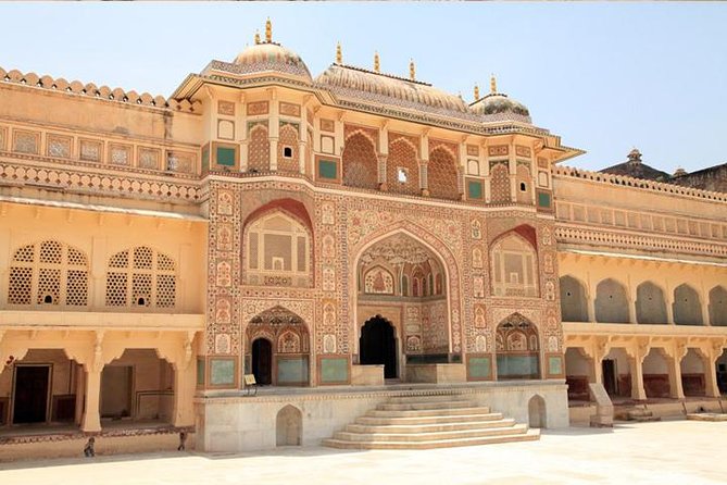 Full-Day Jaipur City Tour with Amber Fort and City Palace - Hawa Mahal explains Jaipur’s famous pink facade
