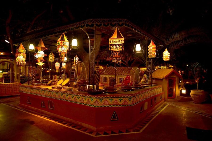 Jaipur: Chokhi Dhani Local Village Experience - Entering the village setting after dark