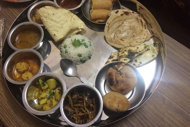Traditional Dinner with Indian Family in Jaipur With Transfers - The $63 price and what it covers